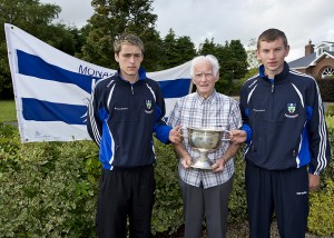 Brian Finn, a member of the 1945 Ulster Championship team pictured with current minors Mark Kelly and Ronan McNamara.