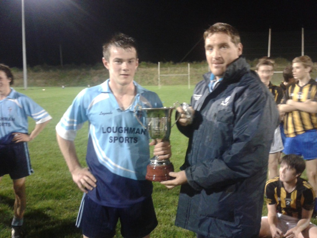 Paul O Connor presenting Barry Kerr with winning cup