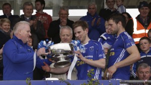 Monaghan GAA Vice Chairman Michael Owen McMahon presents the Mick Duffy Cup to Donal Morgan, Scotstown.