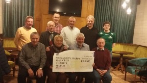 Club members with the cheque presented to local causes from our charity match