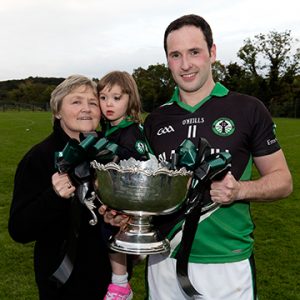 Blackhill Captain Darren Woods and Club chair Bernadette Courtney with the Packie Boylan Cup after winning the JFC on Sunday 09-10-2016