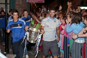 Conor Galligan and Neil McAdam with the Anglo-Celt Cup in Monaghan town at Monday night's reception.