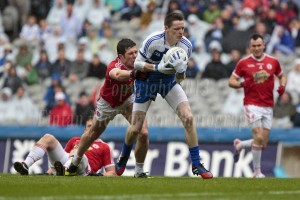 Conor McManus Monaghan is hauled down by Sean Cavanagh of Tyrone